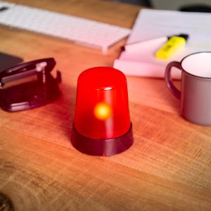 Desktop alarm on a desk with an office background